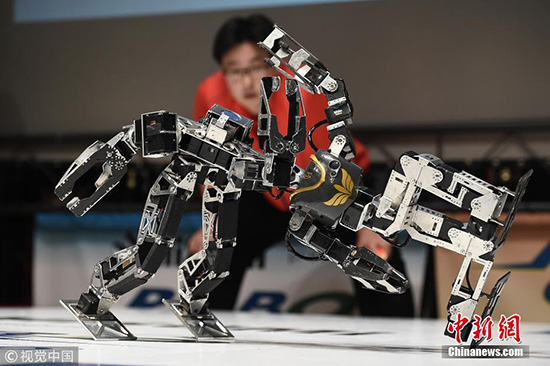 日本举办机器人“武林大会” 机器人对战火药味十足